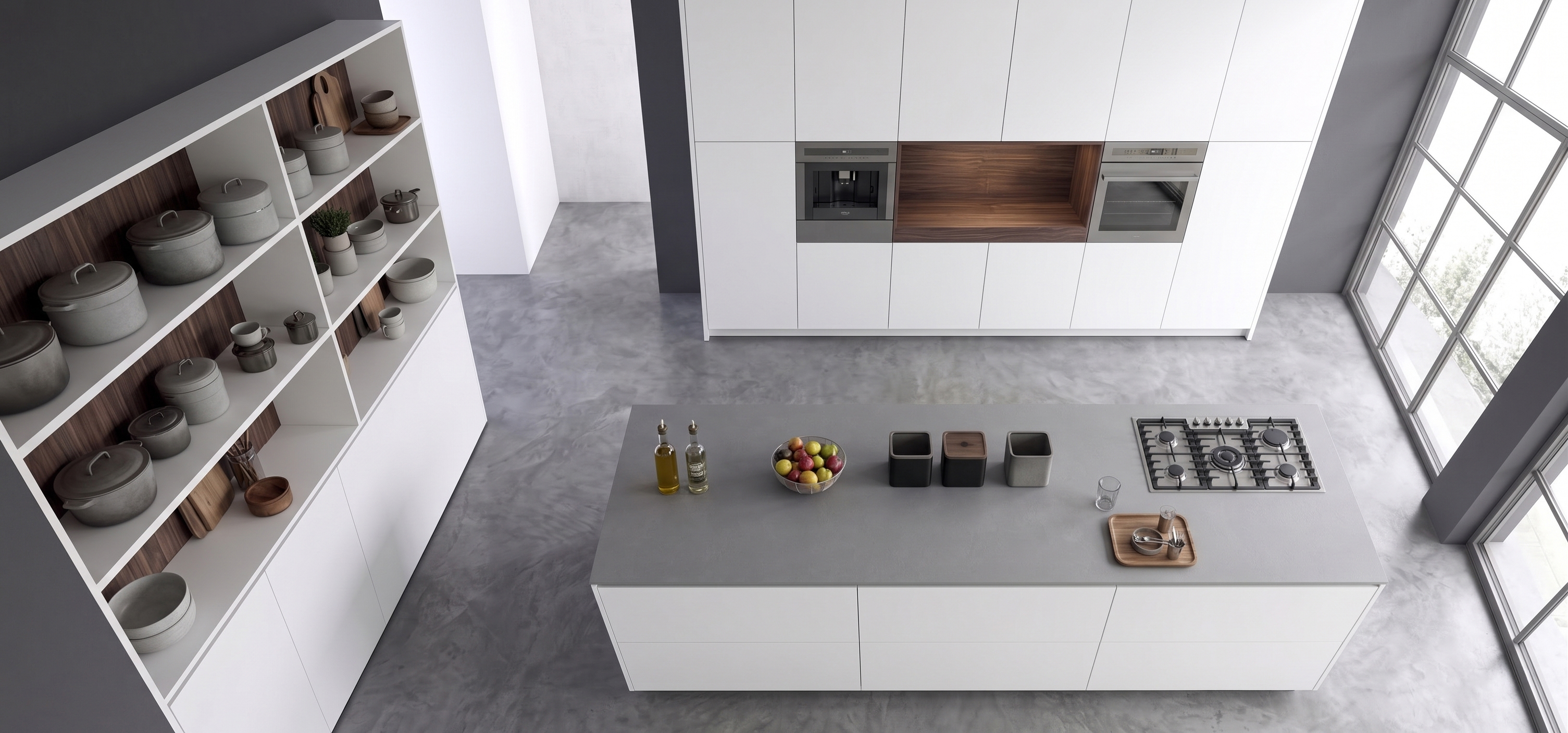 Achroma kitchen — overhead view of island and storage wall